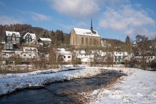 Panoramic image of Beyenburg close to Wuppertal on a winter day with snow covered landscape, Bergisches Land, Germany