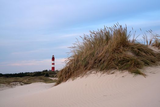Panoramic image of the Wittduen lighthouse at sunset, Amrum, Germany