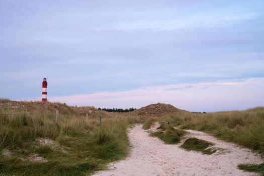 Panoramic image of the Wittduen lighthouse at sunset, Amrum, Germany