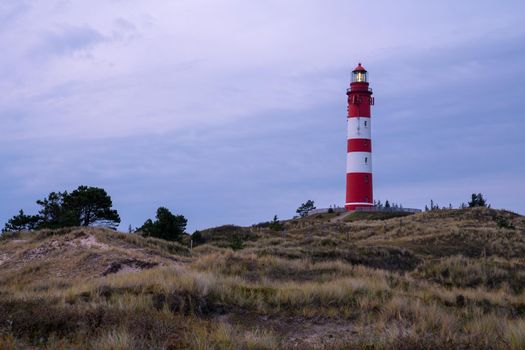 Panoramic image of the Wittduen lighthouse at sunset, Amrum, Germany