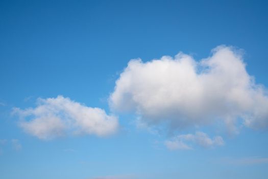 Low angle view to sky with cumulus clouds