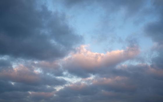 Low angle view to sky with cumulus clouds