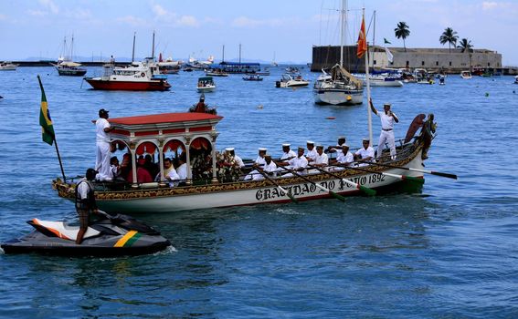 salvador, bahia / brazil - january 1, 2016: vessel Galeota Gratidao do Povo carries the image of Bom Jesus dos Navegantes during a maritime procession through the Todos os Santos Bay.