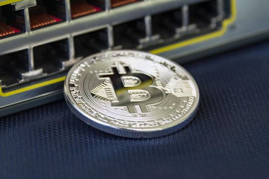 Mint bitcoin with ethernet ports on the background