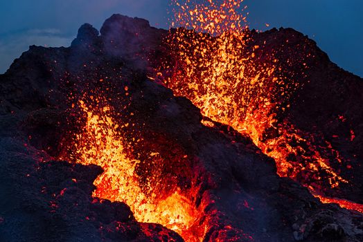 Closeup of Fagradalsfjall volcanic eruption at night in Reykjanes peninsula around 40 kilometres from Reykjavik, Iceland