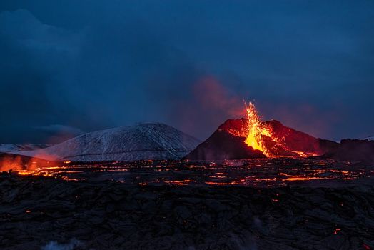 Fagradalsfjall volcanic eruption at night in Reykjanes peninsula around 40 kilometres from Reykjavik, Iceland