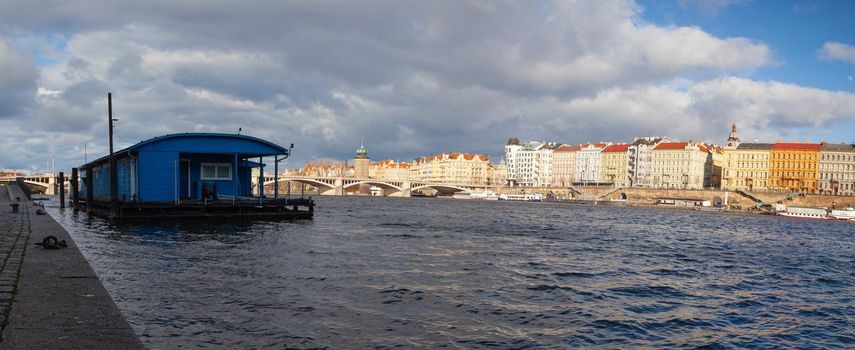 On the riverbank in Smichov, Prague, Czech Republic. Renovated riverbank in the centre of the city is very popular among Prague citizens.