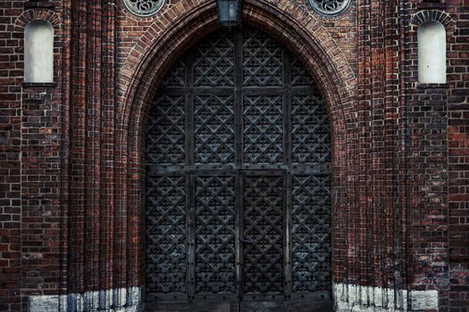 Big old wooden gates to a Gothic castle or cathedral (high details and hdr effect)