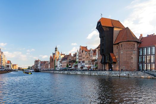 Gdansk, Poland - June 26, 2018: View of the old city of Gdansk on the Motlawa River and famous medieval port crane.