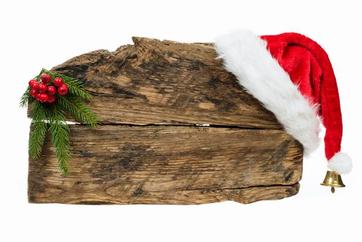 Christmas template - old wooden sign with Santa hat and spruce twig on white background