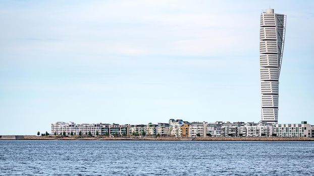 Malmo, Sweden - July 22, 2017: The west harbor area with the Turning Torso skyscraper in Malmo.