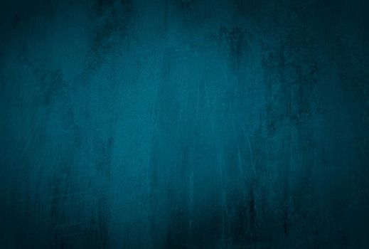 Vintage grunge blue concrete texture studio wall background with vignette