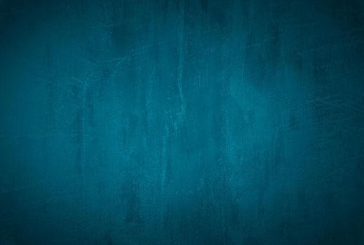 Vintage grunge blue concrete texture studio wall background with vignette