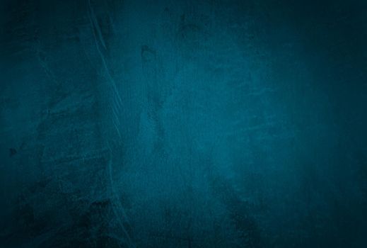 Vintage grunge blue concrete texture studio wall background with vignette