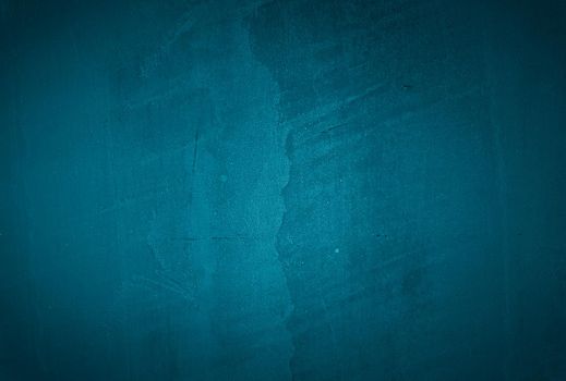 Vintage grunge blue concrete texture studio wall background with vignette