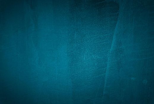 Vintage grunge blue concrete texture studio wall background with vignette