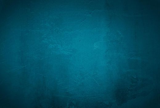 Vintage grunge blue concrete texture studio wall background with vignette