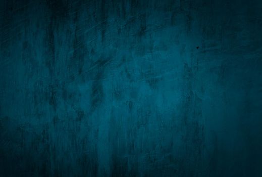 Vintage grunge blue concrete texture studio wall background with vignette