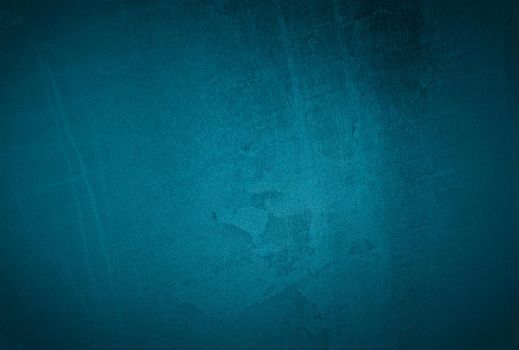 Vintage grunge blue concrete texture studio wall background with vignette