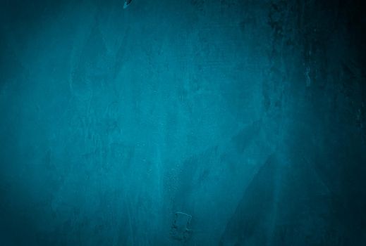 Vintage grunge blue concrete texture studio wall background with vignette