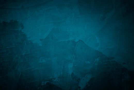 Vintage grunge blue concrete texture studio wall background with vignette