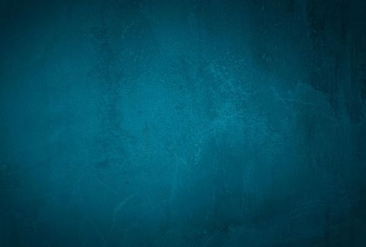 Vintage grunge blue concrete texture studio wall background with vignette