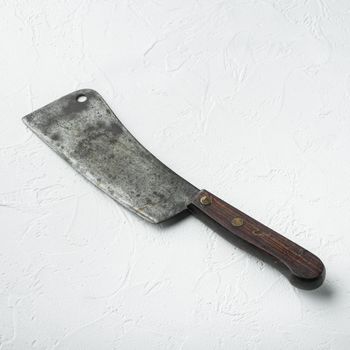 Kitchenware, Butcher cleaver, on white stone surface, square format