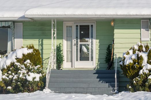 Residential house entrance on bright winter day in British Columbia, Canada
