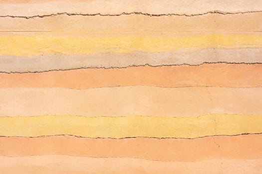 Colored concret background as layers of desert sands