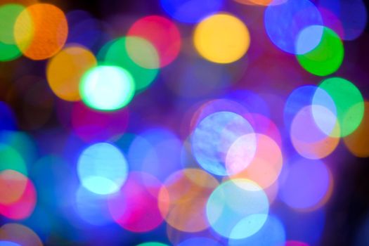 Abstract blurred multicolored of LED lights bulb at night on Christmas and Happy New Year Event, bokeh blurred background