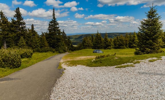 Long mountain trail with panorama if Karkonosze Giant Mountains around