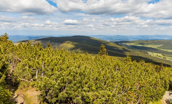 Long mountain trail with panorama if Karkonosze Giant Mountains around