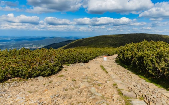 Long mountain trail with panorama if Karkonosze Giant Mountains around