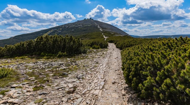 Long mountain trail with panorama if Karkonosze Giant Mountains around