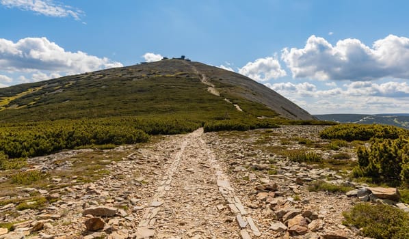 Long mountain trail with panorama if Karkonosze Giant Mountains around