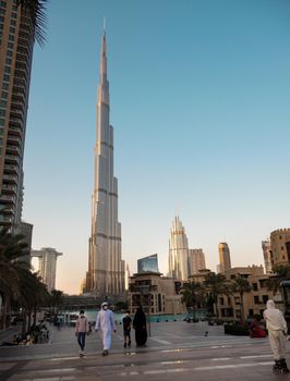 Dec 14th 2020, Dubai, UAE. View of the Burj Park with tourists and residents at evening time with Burj Khalifa in the background captured at Dubai, UAE.