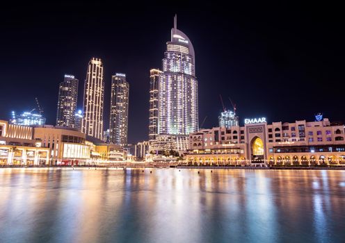 14th dec 2020,Dubai,UAE . Beautiful view of the illuminated souk al bahar ,the dubai mall, the address hotel and other buildings captured at the Dubai mall, Dubai, UAE.