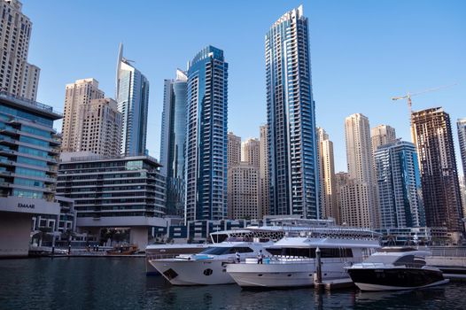 Dec 28th 2020, Dubai Marina. View of the beautiful sky scrappers, apartments, cruise ship deck and hotels captured during the evening time from the Marina mall ,Dubai, UAE.