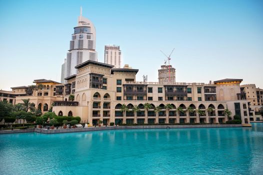 7th JAN 2021,Dubai,UAE . Beautiful view of the souk al bahar ,the dubai mall, The Address hotel and other buildings captured at the recreational boulevard area of the Burj park , Dubai,UAE.