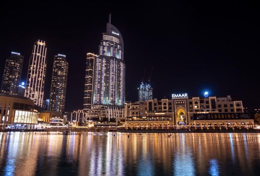 7th JAN 2021,Dubai,UAE . Beautiful view of the illuminated souk al bahar ,the dubai mall, the address hotel and other buildings captured at the Dubai mall, Dubai, UAE.