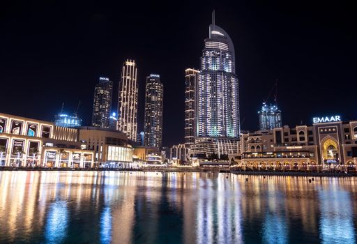 7th JAN 2021,Dubai,UAE . Beautiful view of the illuminated souk al bahar ,the dubai mall, the address hotel and other buildings captured at the Dubai mall, Dubai, UAE.