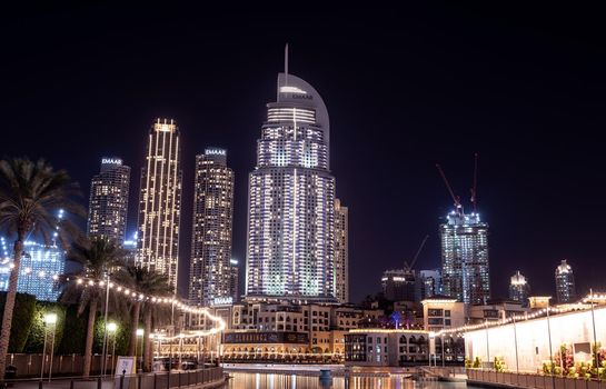 7TH JAN 2021,Dubai,UAE . Beautiful view of the illuminated address hotel, souk al bahar ,the dubai mall, and other buildings captured at the Dubai mall boulevard , Dubai, UAE.