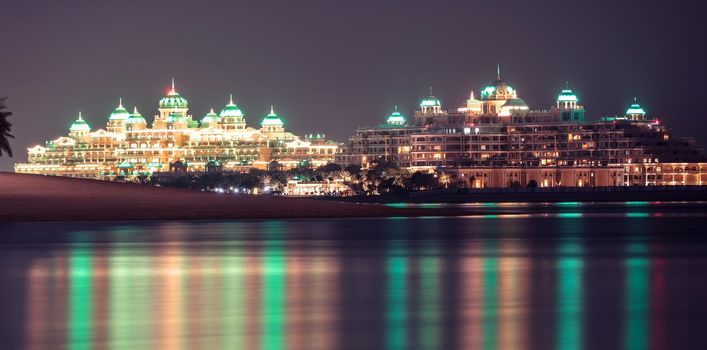 Jan 15th 2021-Dubai, United Arab Emirates. The beautifully illuminated Emerald Palace Kempinski hotel at night captured from The Pointe, Dubai,UAE.