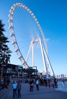 Jan 22, 2021, Dubai,UAE. Beautiful view of Dubai eye with tourists and visitors captured at the Ain Dubai in Blue water islands, Dubai , UAE.