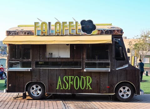 Feb 12th, 2021-Dubai, United Arab Emirates - Food truck selling the traditional felafel dish at Riverland Dubai Parks and Resorts,Dubai, United Arab Emirates.