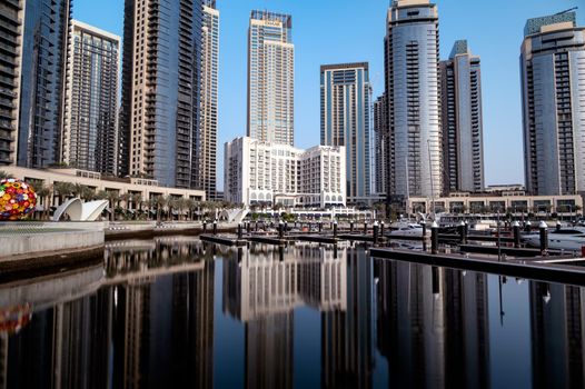 12th march 2021,Dubai,UAE. Dubai creek harbor skyline with embankment promenade ,hotels, shops and residences captured in the evening time at the Dubai creek harbor, Ras al khor, Dubai , UAE.