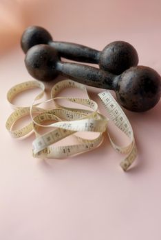 Diet Concept Slimming with Exercise, Black Drumbell on Floor, Fitness Sports