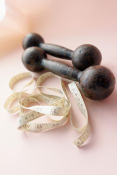 Diet Concept Slimming with Exercise, Black Drumbell on Floor, Fitness Sports