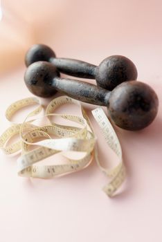 Diet Concept Slimming with Exercise, Black Drumbell on Floor, Fitness Sports