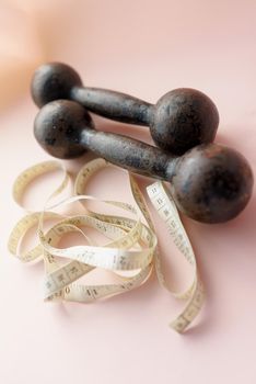 Diet Concept Slimming with Exercise, Black Drumbell on Floor, Fitness Sports